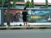 Puluhan Seniman Mural Percantik Tembok Stasiun Purwokerto