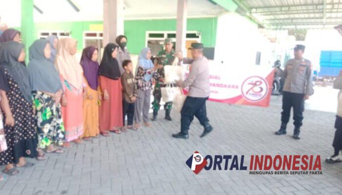 Polsek Krembung Bagikan 50 Paket Sembako Peringati Hari Bhayangkara Ke-78