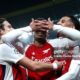 Pemain Arsenal merayakan gol saat laga melawan Sporting CP di Liga Champions