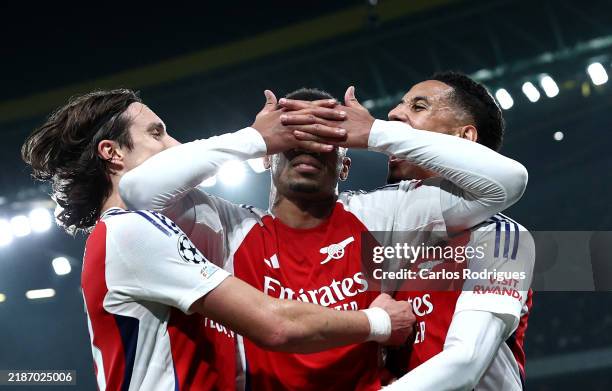 Selebrasi pemain Arsenal usai gol kemenangan ke gawang Sporting