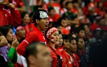 Suporter Timnas Indonesia di laga Piala AFF, menggambarkan atmosfer kompetisi ASEAN