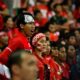 Suporter Timnas Indonesia di laga Piala AFF, menggambarkan atmosfer kompetisi ASEAN